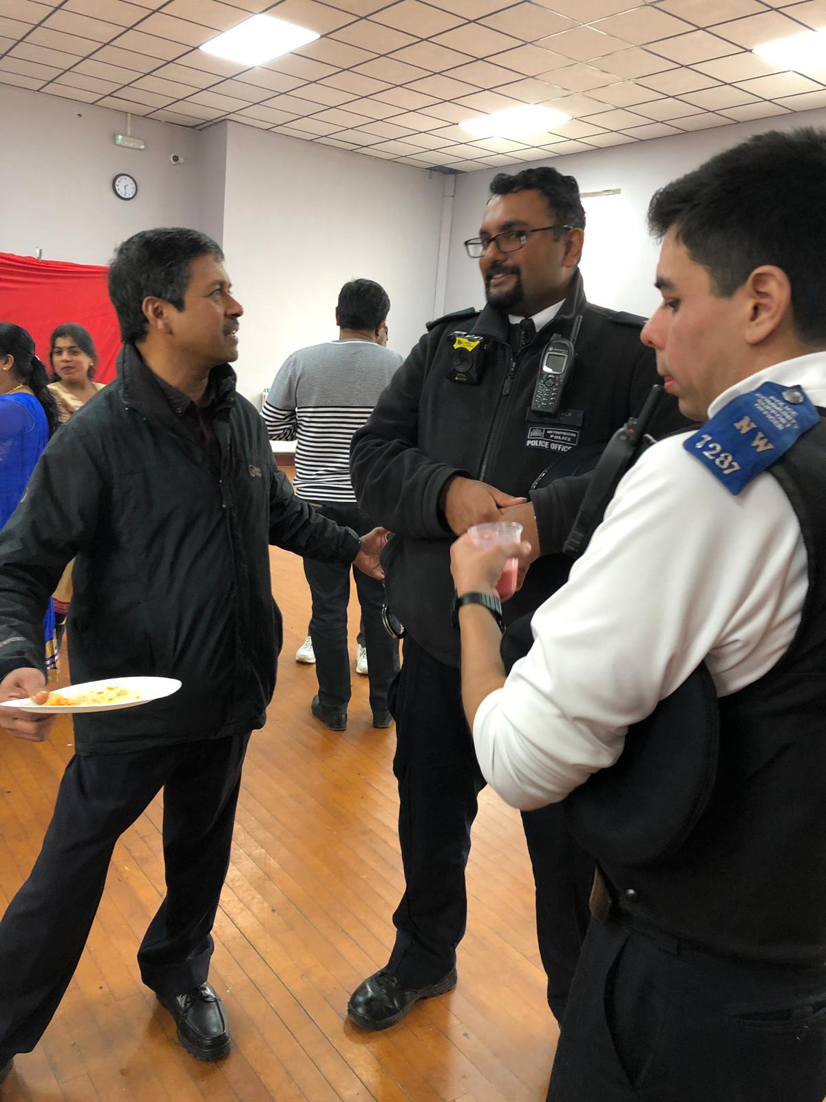 Officers join the community at the temple