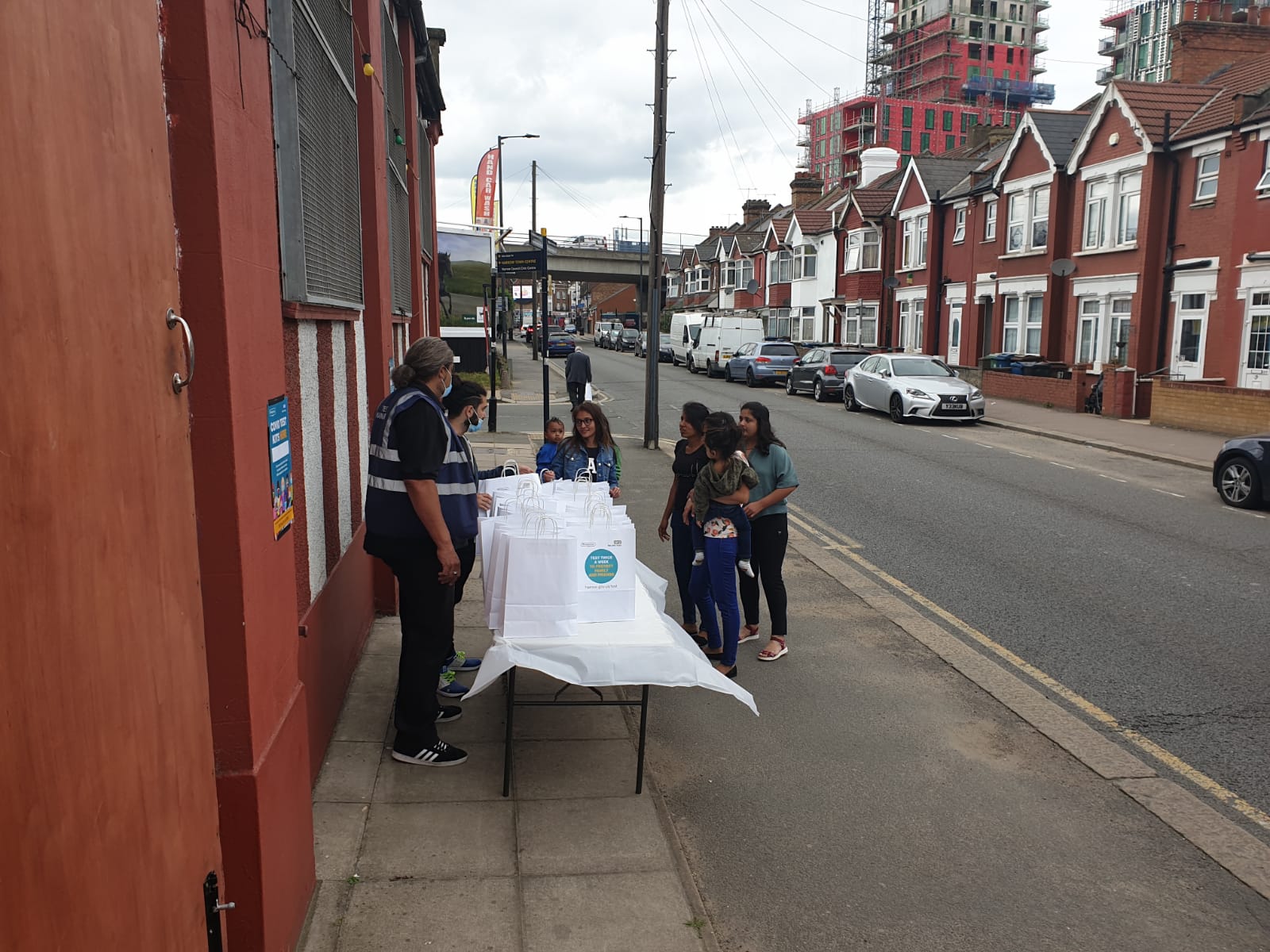 Handing out test kits on Masons Avenue